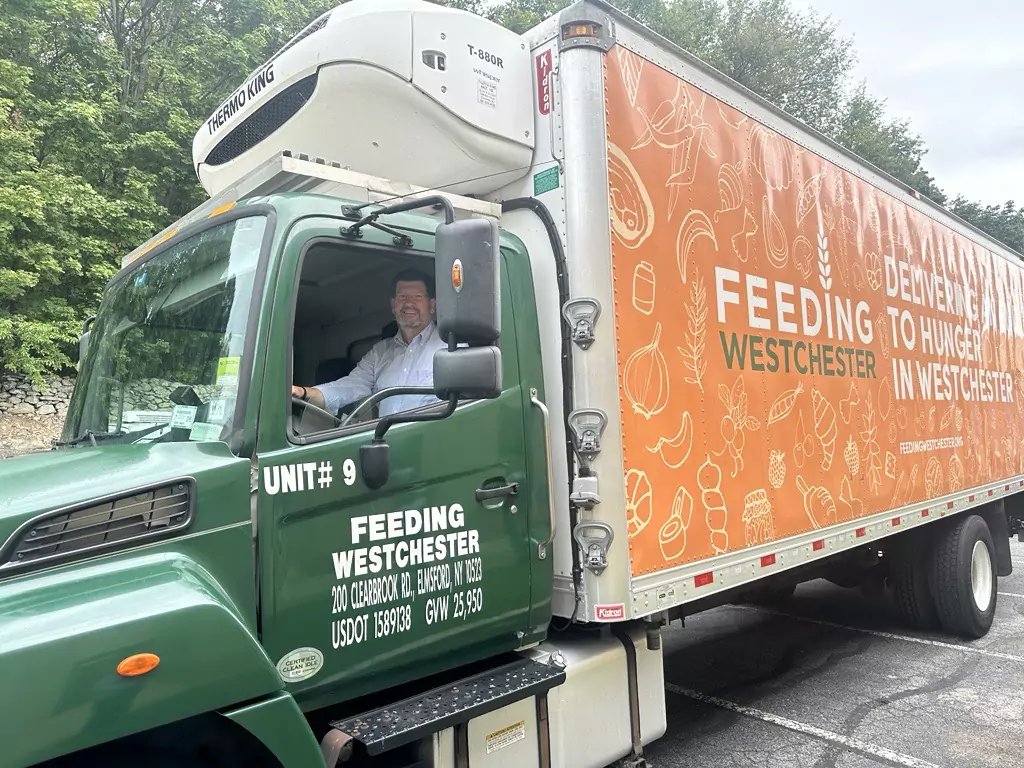 Image of Feeding Westchester truck